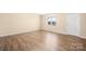 Bright living room features wood floors and natural light from the window at 341 Massey Deal Rd, Statesville, NC 28625