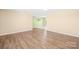 Spacious living room with wood floors, bright lighting, and neutral walls at 341 Massey Deal Rd, Statesville, NC 28625