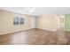 Living room features wood floors and a ceiling fan at 341 Massey Deal Rd, Statesville, NC 28625