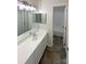 The bathroom features a sink with modern fixtures and a tub in a separate room at 3632 Farm Lake Sw Dr, Concord, NC 28027