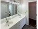 Bathroom with double sinks, a vanity, and modern fixtures at 3632 Farm Lake Sw Dr, Concord, NC 28027