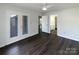 Bright bedroom with double doors that lead to a private backyard at 3632 Farm Lake Sw Dr, Concord, NC 28027