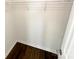 An empty closet with shelving for optimal storage at 3632 Farm Lake Sw Dr, Concord, NC 28027