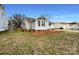 A beautiful single-Gathering home with a well-maintained lawn and landscaping at 3632 Farm Lake Sw Dr, Concord, NC 28027