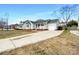 A beautiful single-Gathering home with a spacious driveway and a two-car garage at 3632 Farm Lake Sw Dr, Concord, NC 28027