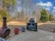 Backyard featuring a built-in grill with countertop space and other furniture and decor at 4856 Pepper Dr, Harrisburg, NC 28075