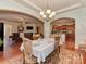 Bright dining room with views into the living room and kitchen, ideal for Gathering meals and gatherings at 4856 Pepper Dr, Harrisburg, NC 28075