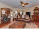 Comfortable living room with hardwood floors, open to the dining area and kitchen, perfect for entertaining at 4856 Pepper Dr, Harrisburg, NC 28075