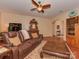 Spacious living room featuring hardwood floors, an area rug, and stylish furniture for a cozy atmosphere at 4856 Pepper Dr, Harrisburg, NC 28075