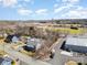Aerial view displays the house's setting, with nearby baseball fields and the surrounding neighborhood at 520 Rogers St, Albemarle, NC 28001
