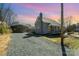 Charming home with gravel driveway and additional building perfect for storage or workspace at 520 Rogers St, Albemarle, NC 28001