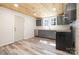 Updated kitchen featuring gray cabinets, new appliances, and bright lighting at 520 Rogers St, Albemarle, NC 28001