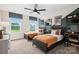 Shared bedroom with two twin beds, stylish decor, and large windows offering abundant natural light and outdoor views at 5220 Hatcher Creek Rd # 56, Charlotte, NC 28215