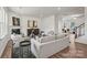 Bright living room featuring a fireplace, modern decor, and hardwood floors at 5227 Hatcher Creek Rd # 43, Charlotte, NC 28215