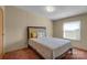 Inviting bedroom with a comfortable bed, soft lighting, and a window offering a pleasant view at 524 Damascus Church Rd, Statesville, NC 28625