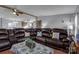 Comfortable living room with a large brown sofa and a view into the dining area and kitchen at 524 Damascus Church Rd, Statesville, NC 28625