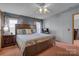 Cozy main bedroom featuring a comfortable bed, bedside table, and soft, natural light at 524 Damascus Church Rd, Statesville, NC 28625