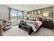 Serene main bedroom with soft carpet, modern decor, and large windows at 558 Mountain View Dr, Monroe, NC 28110