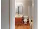 Bathroom featuring a tub, vanity, and toilet with an abundance of natural light at 5921 Amity Springs Dr, Charlotte, NC 28212