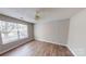 Bright bedroom with a ceiling fan and hardwood floors at 5921 Amity Springs Dr, Charlotte, NC 28212