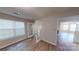 Well-lit living room with an open floor plan and French doors at 5921 Amity Springs Dr, Charlotte, NC 28212