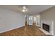 Spacious room has a fireplace and glass paneled doors that lead to other rooms at 5921 Amity Springs Dr, Charlotte, NC 28212