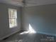 Bright bedroom featuring new floors, fresh paint, and a sunlit window at 635 Acre Ct, York, SC 29745