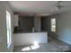 Bright kitchen featuring a breakfast bar, modern fixtures, and natural light at 635 Acre Ct, York, SC 29745