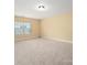 Bright, spacious bedroom with natural light and neutral carpet at 8025 Penman Springs Dr, Waxhaw, NC 28173