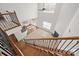Grand two story foyer with decorative staircase and views of the living room at 8025 Penman Springs Dr, Waxhaw, NC 28173