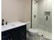 Modern bathroom featuring a shower with glass door, sleek vanity and modern fixtures at 811 Sanford St, Marshville, NC 28103