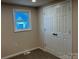 Bedroom featuring window with double door closet at 811 Sanford St, Marshville, NC 28103