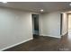 Bright living space with modern flooring and fresh paint, creating a clean and inviting atmosphere at 811 Sanford St, Marshville, NC 28103