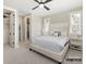 Serene bedroom with neutral tones, plush bedding, and ample natural light at 8328 Victoria Lake Dr, Waxhaw, NC 28173