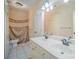 Well-lit bathroom featuring a double sink vanity and built-in storage at 9423 Belmont Ln, Marvin, NC 28173