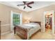 Inviting bedroom featuring a comfortable bed, closet, and natural light at 9423 Belmont Ln, Marvin, NC 28173