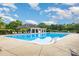 Large community pool with plenty of lounge chairs and a covered seating area for residents at 9423 Belmont Ln, Marvin, NC 28173