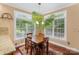 Bright dining area featuring hardwood floors and natural light at 9423 Belmont Ln, Marvin, NC 28173