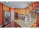 Modern kitchen with stainless steel appliances and granite countertops, perfect for cooking and entertaining at 9423 Belmont Ln, Marvin, NC 28173