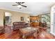 Elegant living room featuring hardwood floors and seamless kitchen access at 9423 Belmont Ln, Marvin, NC 28173