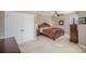 Comfortable main bedroom with plush carpet and a ceiling fan at 9423 Belmont Ln, Marvin, NC 28173