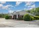 Modern brick office building with well-maintained landscaping and ample parking space at 9423 Belmont Ln, Marvin, NC 28173