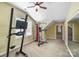 Bright exercise room equipped with workout machine, natural light, and ample space for fitness activities at 9627 Baileywick Rd, Charlotte, NC 28277