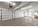 Spacious garage with multiple doors and ample space for parking and storage with lots of room for storage at 9627 Baileywick Rd, Charlotte, NC 28277