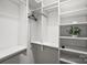 Organized walk-in closet with shelving, hanging rods, and ample storage space at 9627 Baileywick Rd, Charlotte, NC 28277
