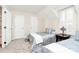Bedroom featuring 2 twin beds, bright natural light, and neutral walls at 9800 Deer Brook Ln, Charlotte, NC 28210