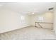 Spacious bonus room with neutral walls and large windows for lots of light at 9800 Deer Brook Ln, Charlotte, NC 28210