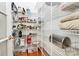 Walk-in pantry with ample shelving for organized storage of food and household items at 9800 Deer Brook Ln, Charlotte, NC 28210