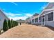 View of backyard and other homes in the neighborhood at 982 Old Trace Nw Rd, Concord, NC 28027