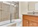 Bathroom featuring a glass door walk in shower and granite countertop vanity at 982 Old Trace Nw Rd, Concord, NC 28027